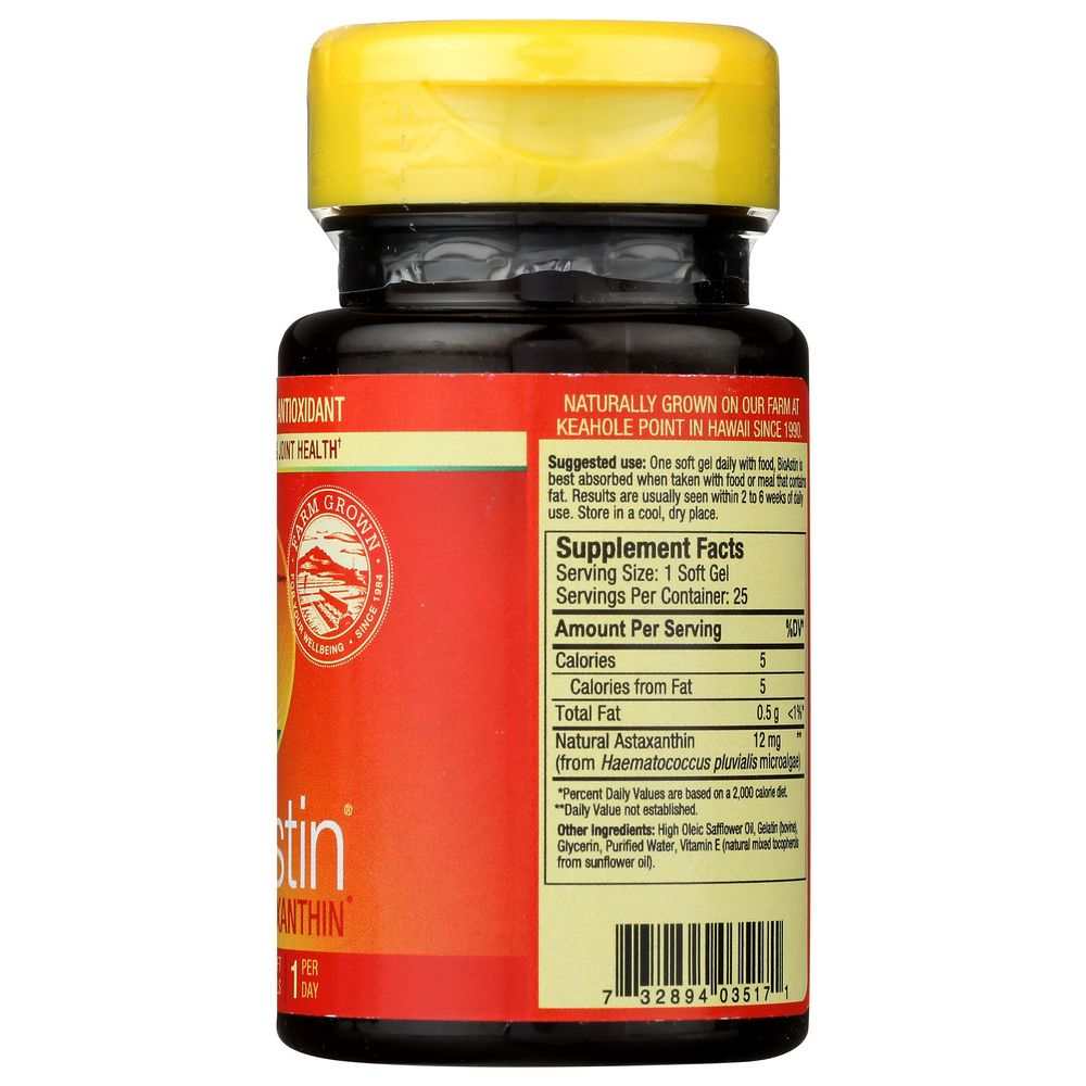 Astaxanthin supplement bottle with nutrition facts label and yellow cap, health product