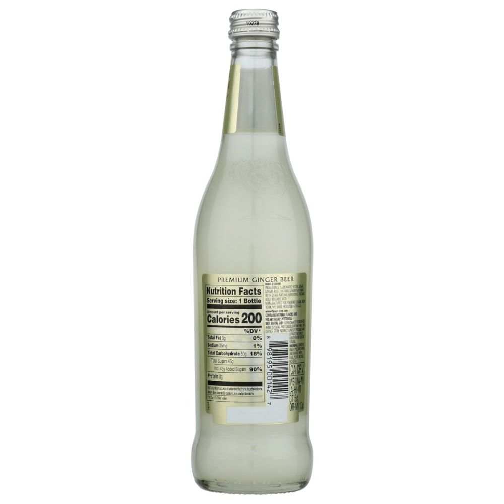 Clear glass bottle of premium ginger beer with visible nutrition facts label