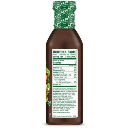 Walden Farms Honey Balsamic Vinaigrette bottle with salad ingredients and caramelized pears