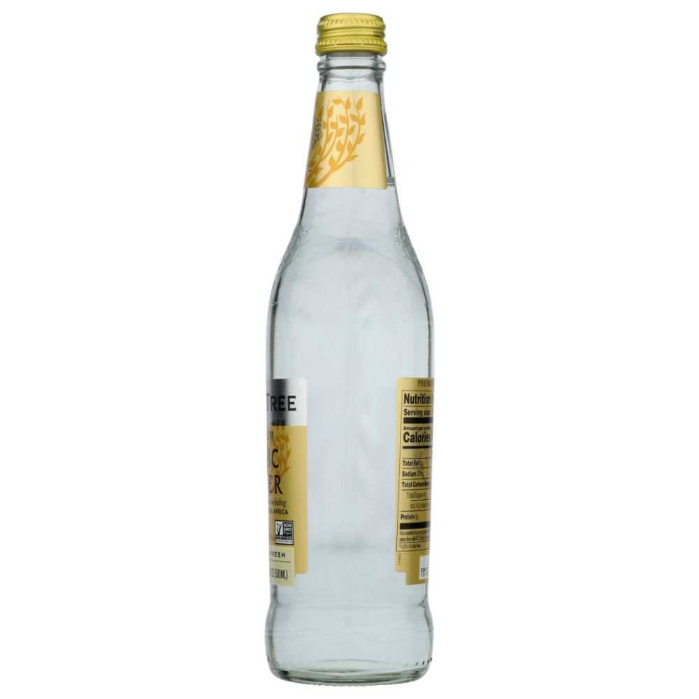 Clear glass bottle with yellow label and cap, nutrition facts visible, isolated on white