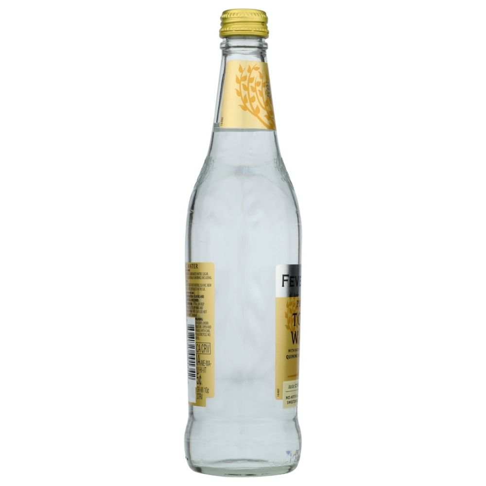 Clear glass bottle of tonic water with yellow label and cap on white background