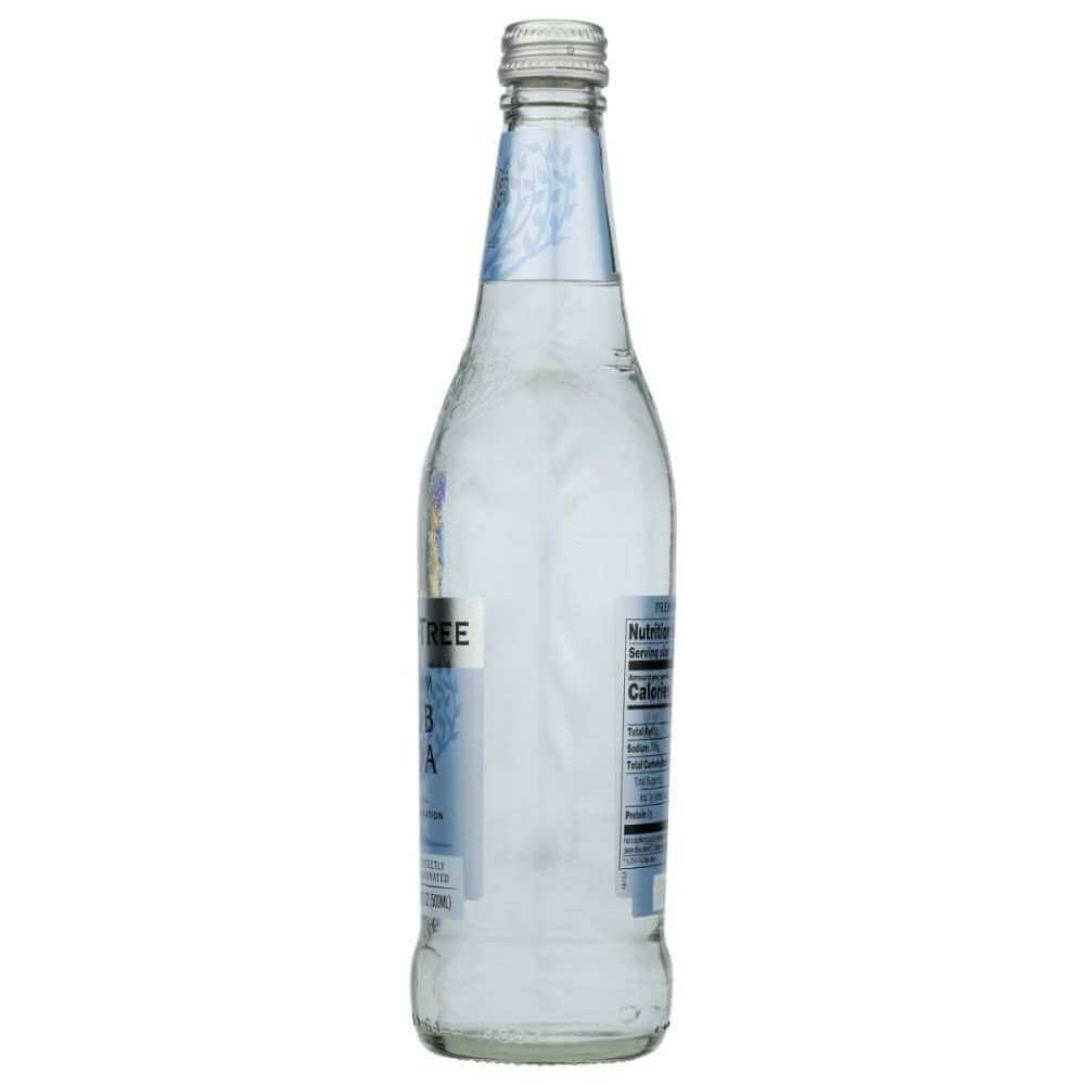 Clear glass bottle of sparkling water with a blue label and nutritional facts
