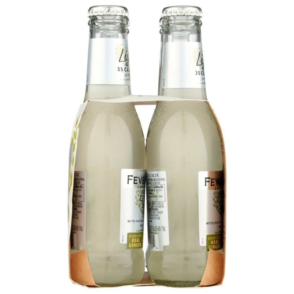 Pack of four clear glass bottles of light ginger beer with visible calorie label