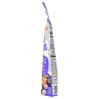 Side view of a purple snack pouch with nutrition label, blueberries and carrot graphics