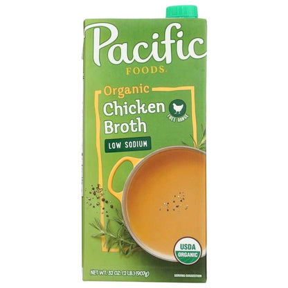 Pacific Foods Low Sodium Organic Free Range Chicken Broth 32 oz carton with fresh chicken and herbs background