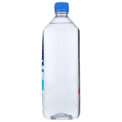 Clear plastic water bottle with blue cap on white background, hydration, wellness product